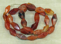 Strand of Assorted Hand-Carved Carnelian Beads from the Lou Zeldis Collection