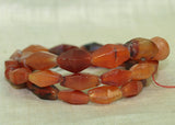 Strand of Hand-Carved Carnelian Bicones from the Lou Zeldis Collection