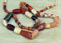 Strand of Small Antique and Old Carnelian Beads from Afghanistan