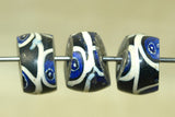 Venetian Blue & Black Swirl Angled Cut bead