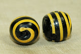 Black Glass Bead with Yellow stripe