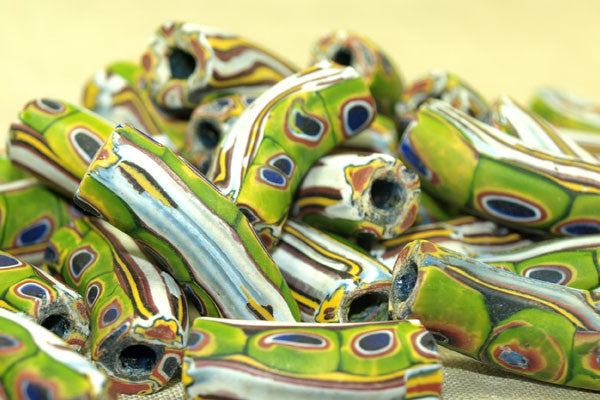 Very Cool Antique Green Millefiori Elbow Bead Beadparadise very-cool-antique-green-millefiori-elbow-bead-beadparadise