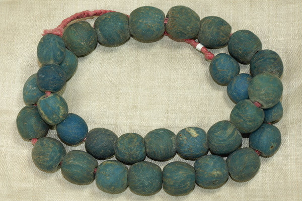 Strand of Rare medium size Teal Majapahit Beads