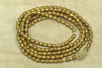 Small 4mm Brass Bicones from Ethiopia