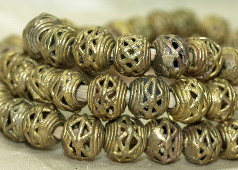 Strand of Small Brass Basket Beads from Ghana