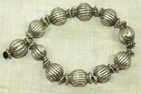 Strand of small Antique Silver Beads from India