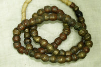 Strand of Antique Cast Bicone Brass Beads