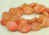 Vintage German Glass Beads - Twisted Oval Orange Matte