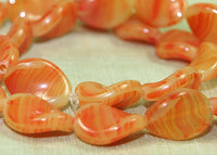 Vintage German Glass Beads - Twisted Oval Orange